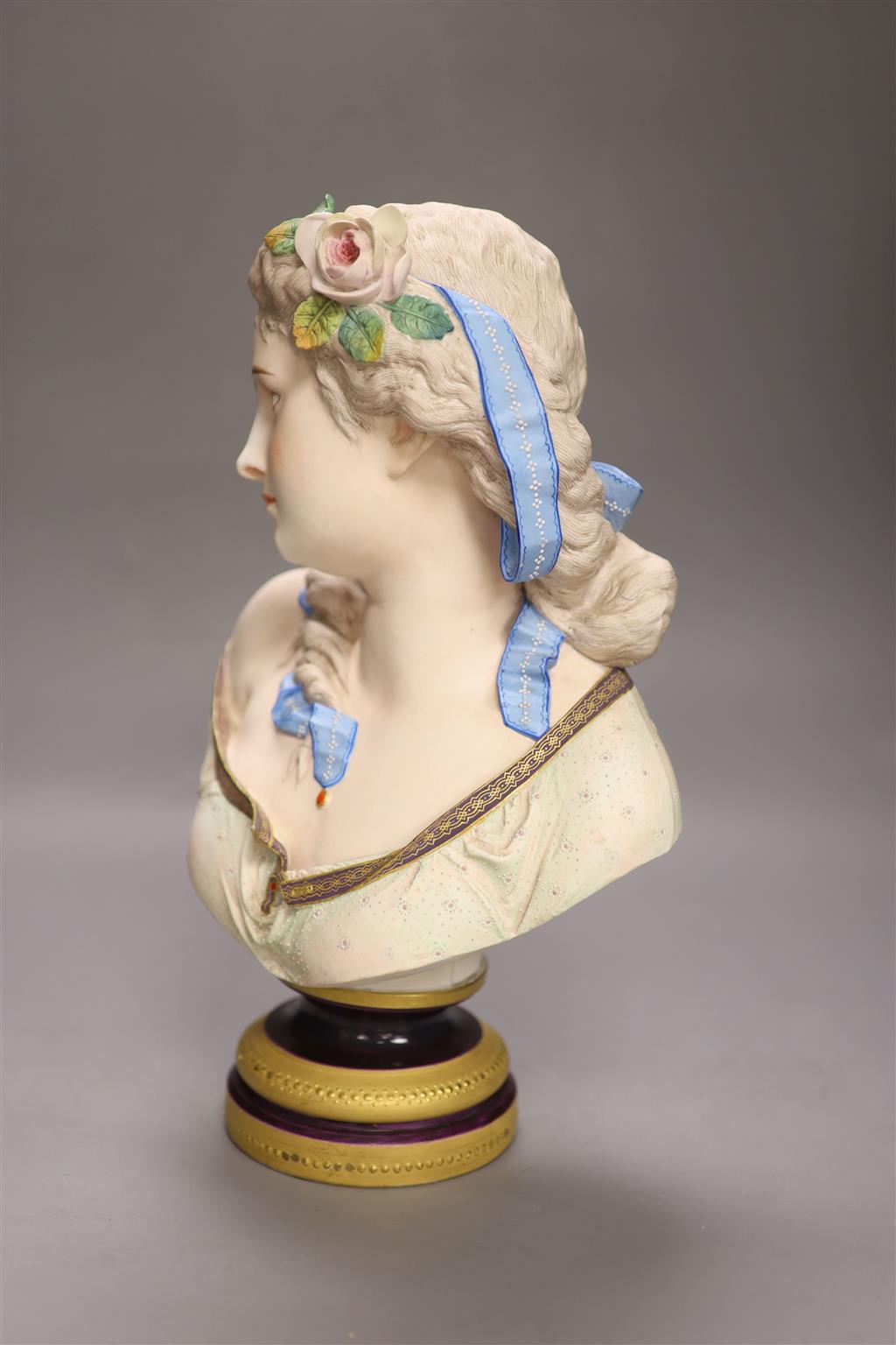 After A. Carrier, a 19th century French bisque porcelain bust of a young lady, 37cm